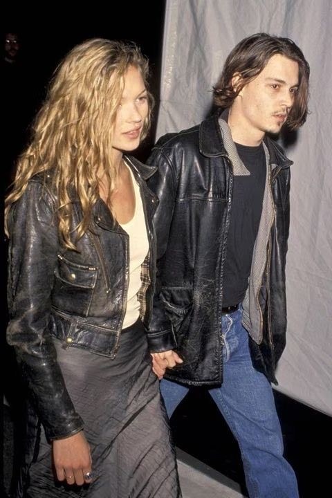 Leather jacket with a long dark skirt